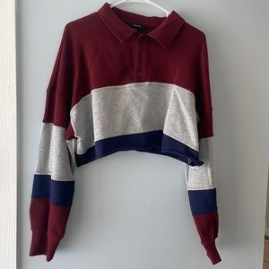 Long sleeve cropped polo from Forever 21. Size large and is red, grey, and blue.